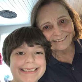Marya Smith posing with her grandson Peter